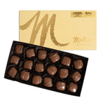 Milk chocolate caramel supreme in box white background