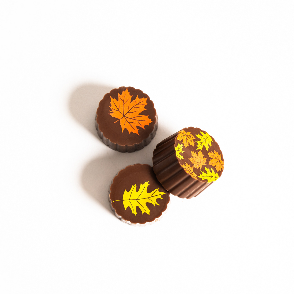 Milk chocolate maple truffles white background